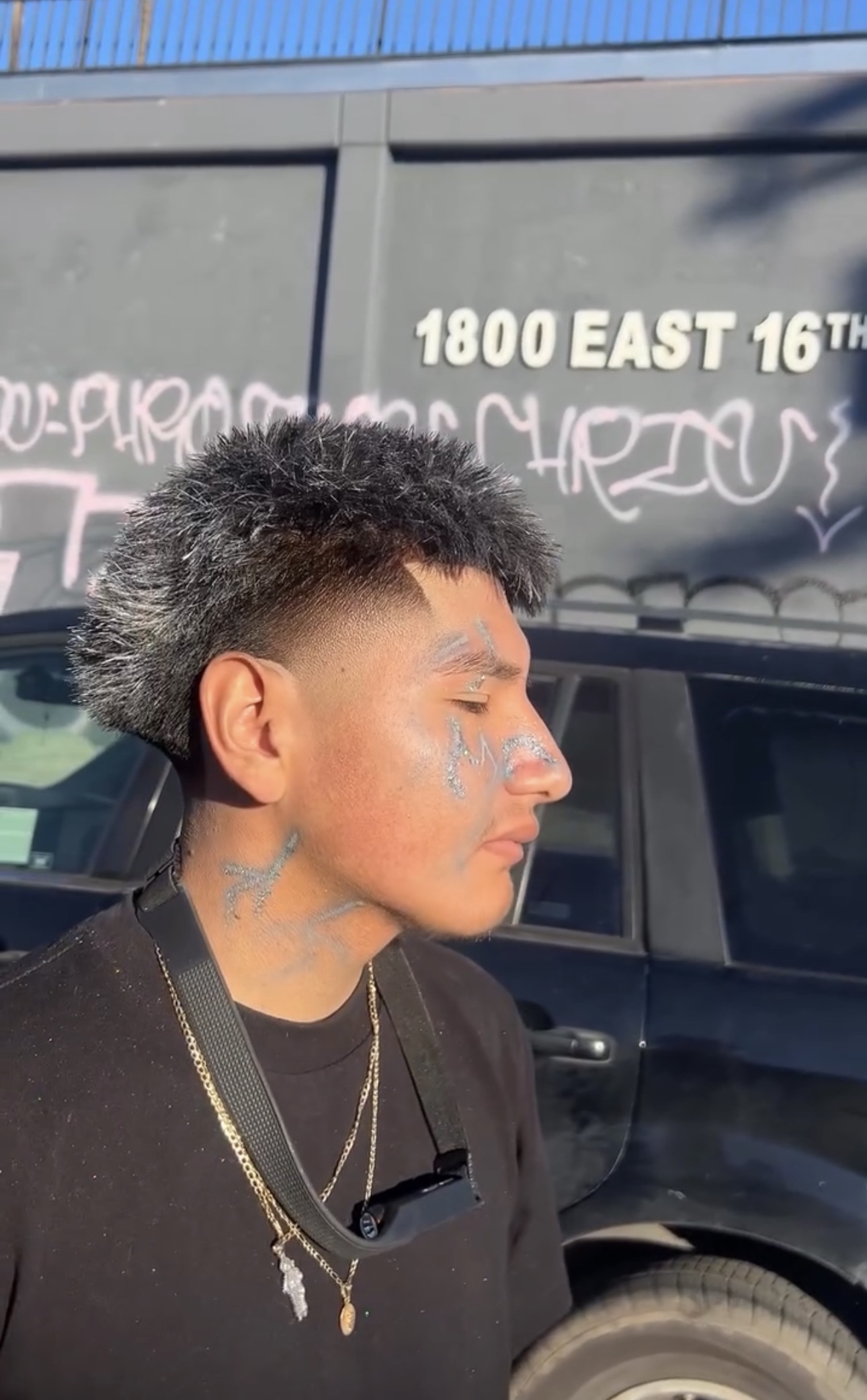 Textured spiky fade with clean lineup